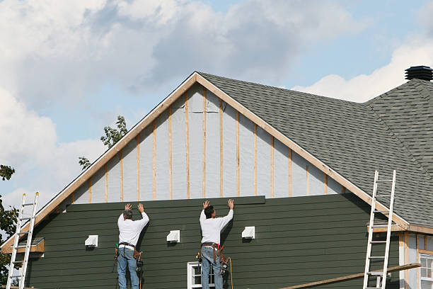 Professional Siding Contractor technician working in Riverdale, MD